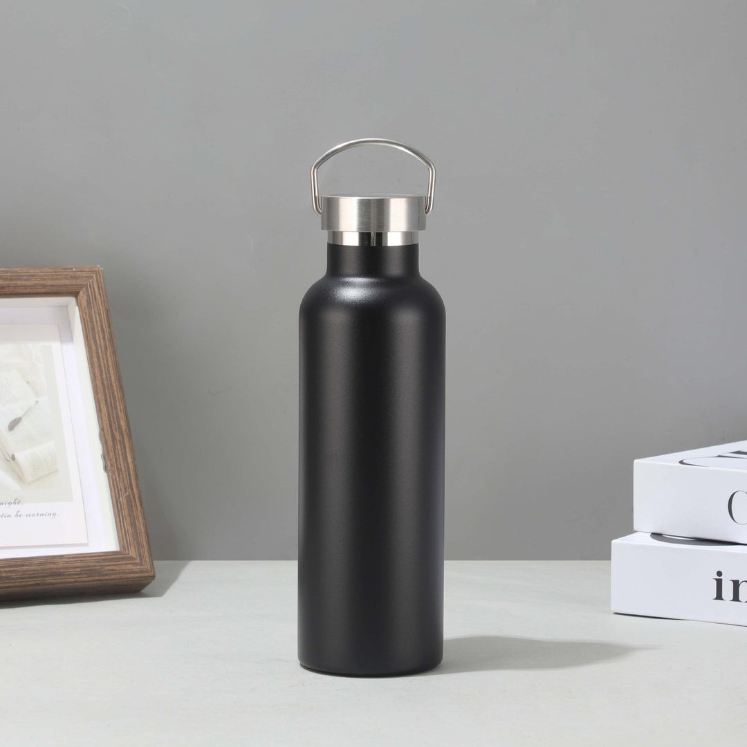 Women's stainless steel insulated drinking bottle with sustainable bamboo lid Kalsten