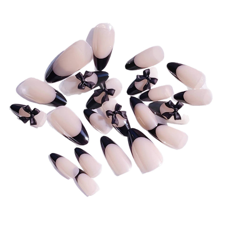 Artistic Stiletto Press-On Nail Design with Bow Accents Kalsten