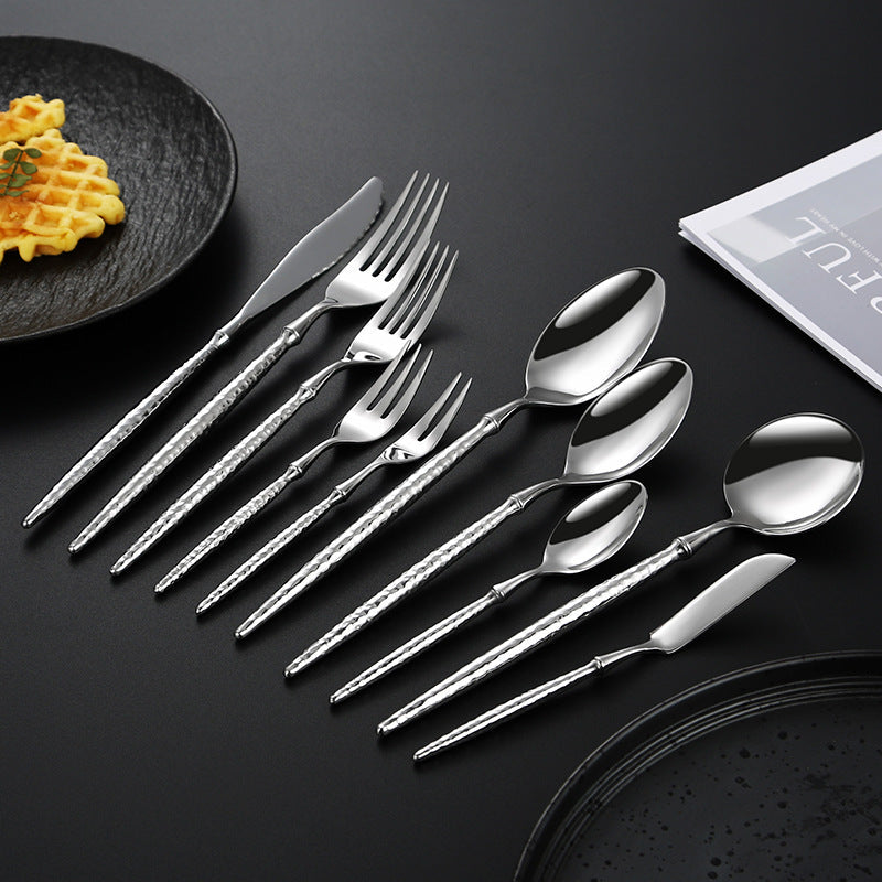 Elegant soup spoon with structured handle Kalsten