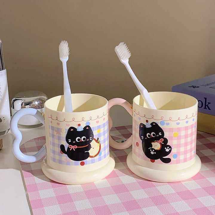 Ceramic mug with playful cat motif Kalsten
