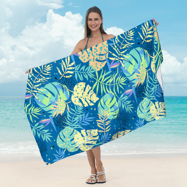 Large beach towel with tropical palm pattern Kalsten
