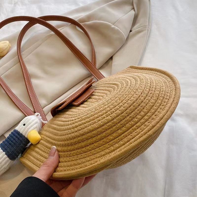 Fashionable Tote Bag Made of Woven Material with Playful Pendant Kalsten