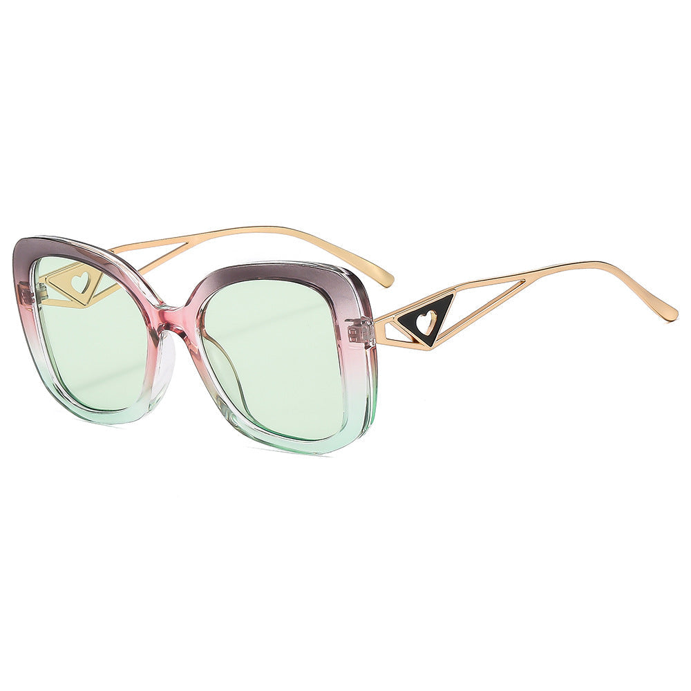 Ladies fashionable oversized sunglasses with luxurious heart detail Kalsten