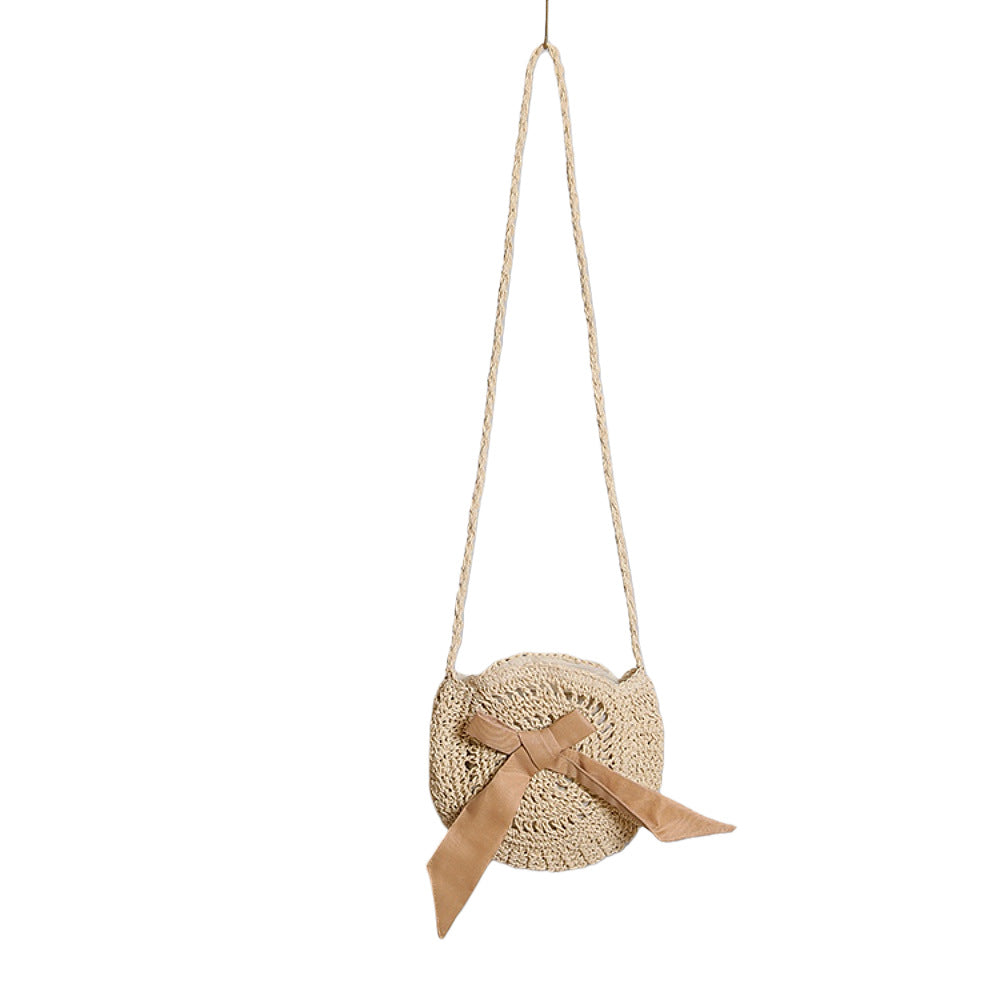 Handwoven shoulder bag with decorative bow accent Kalsten
