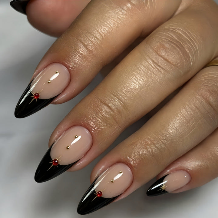 Glamorous artificial nails in stylish stiletto design with golden accents Kalsten
