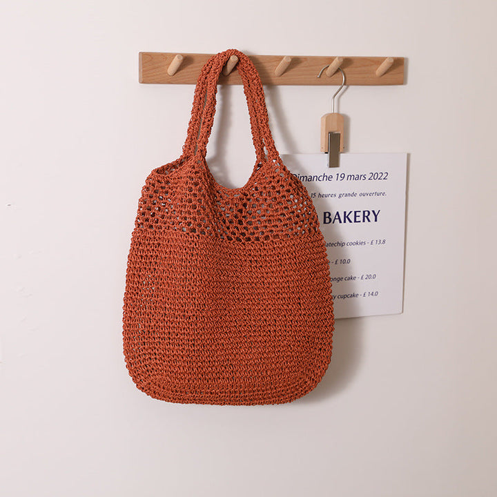 Handcrafted straw bag with wide carrying handle Kalsten