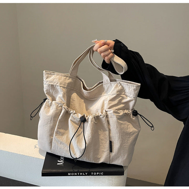 Practical everyday handbag with drawstring Kalsten