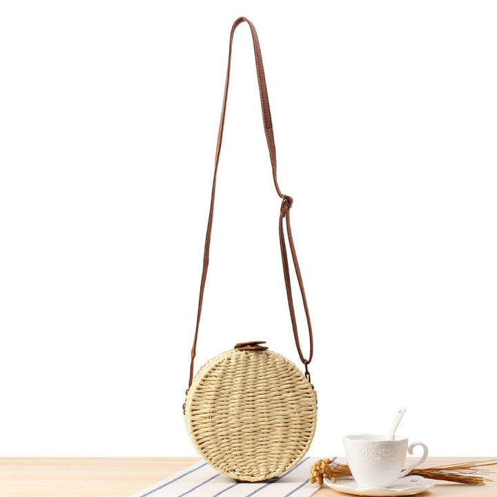 Round basket bag with leather accents Kalsten