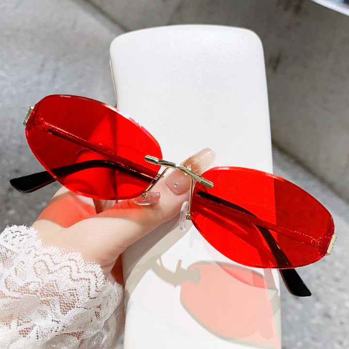 Ladies sunglasses in modern oval design with contrasting frame Kalsten
