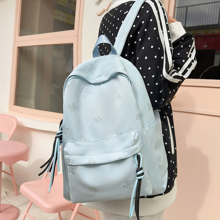 Fashionable backpack with shimmering butterfly design Kalsten