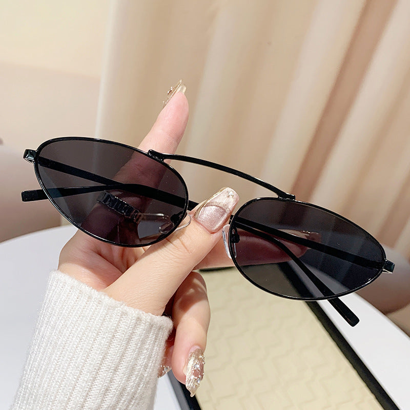 Ladies fashionable sunglasses in elegant oval design Kalsten