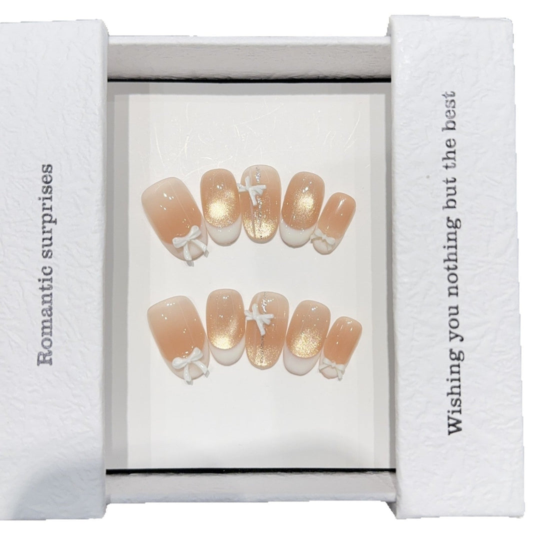 Artificial nails with romantic bow and glitter effects Kalsten