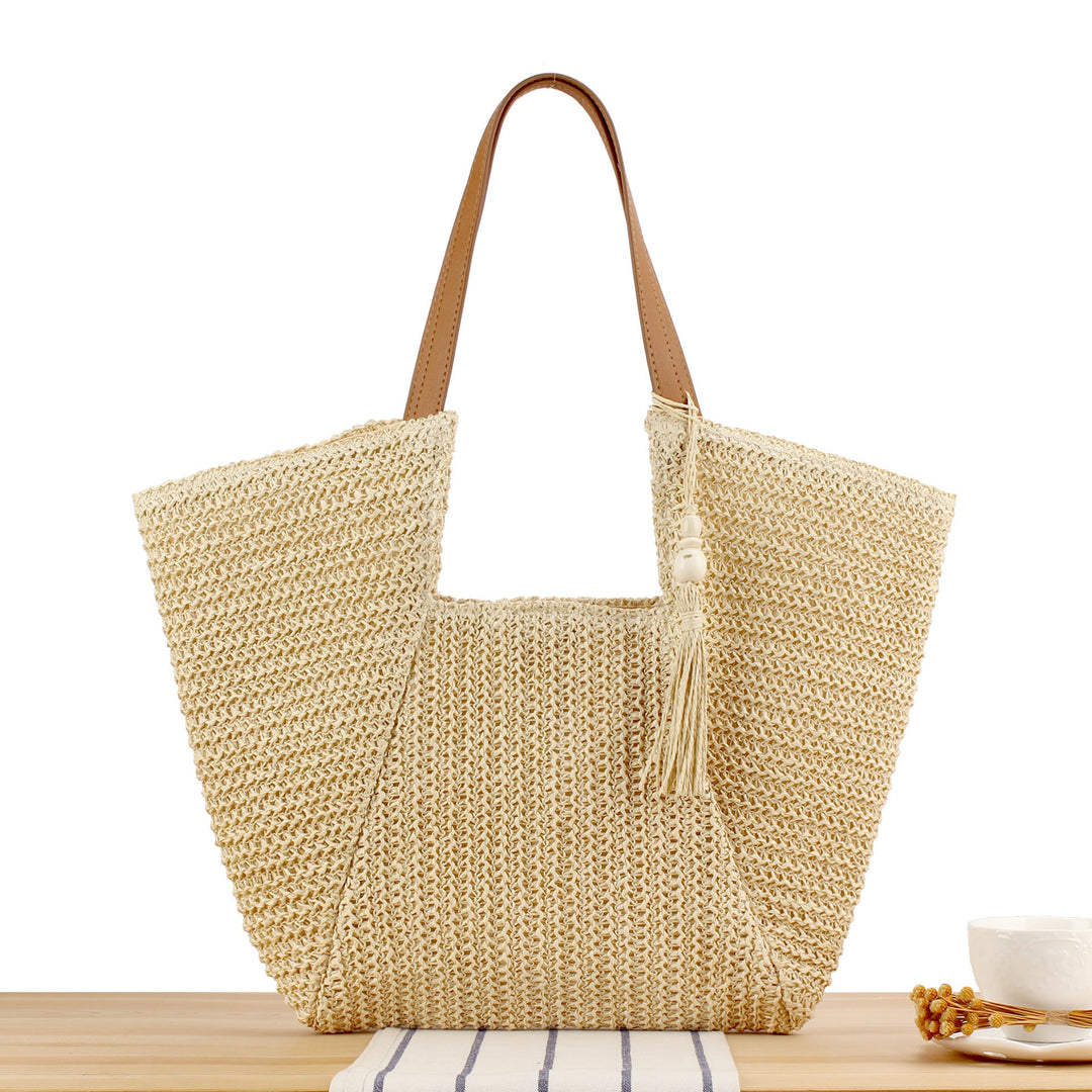 Beach bag made of natural weave with elegant leather accents Kalsten