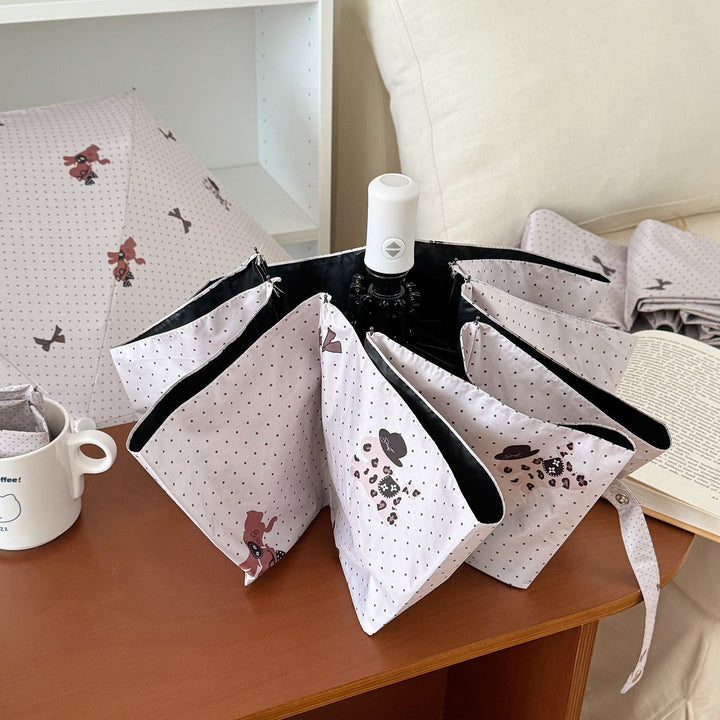 Ladies collapsible umbrella with playful design Kalsten