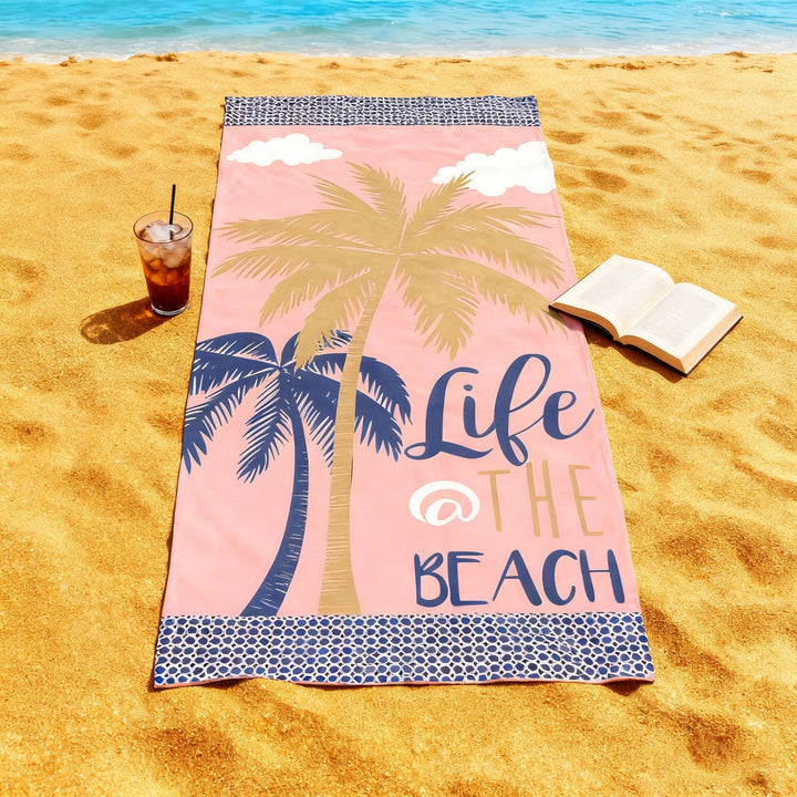 Beach towel with tropical palm leaf pattern Kalsten