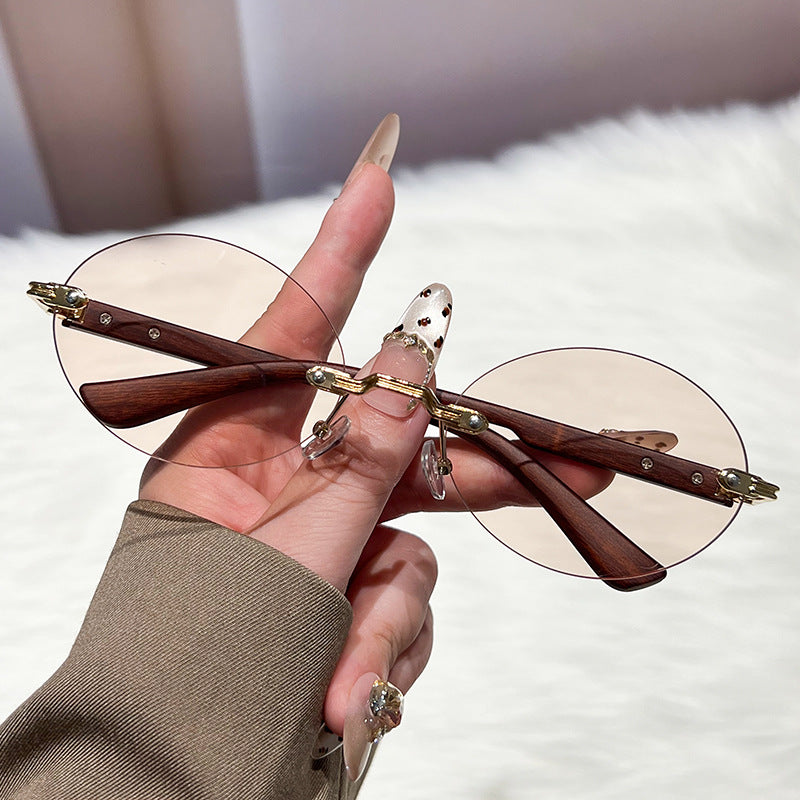 Ladies fashionable and elegant sunglasses with oval design Kalsten