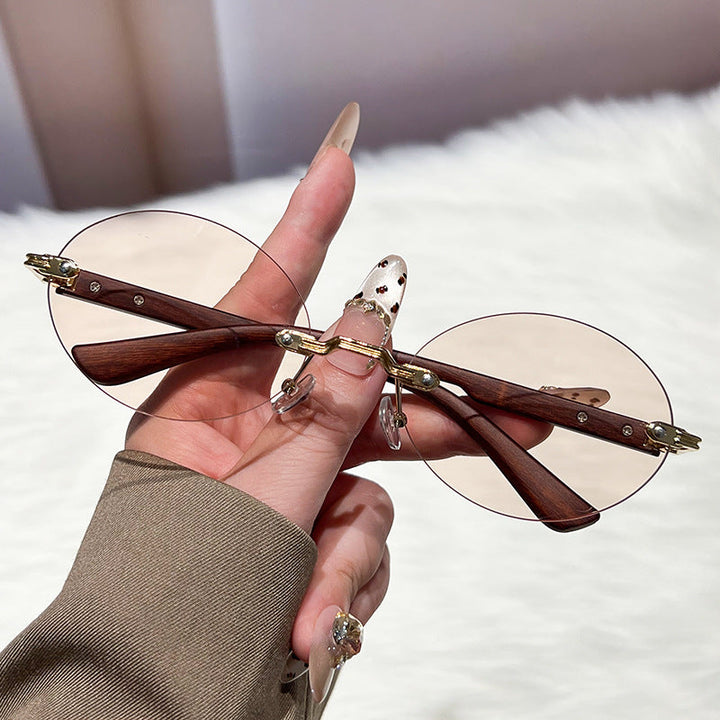 Ladies fashionable and elegant sunglasses with oval design Kalsten
