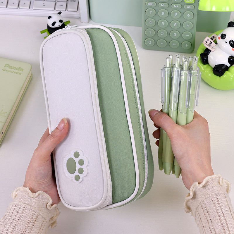 Pencil case with double compartment design and playful paw print motif Kalsten