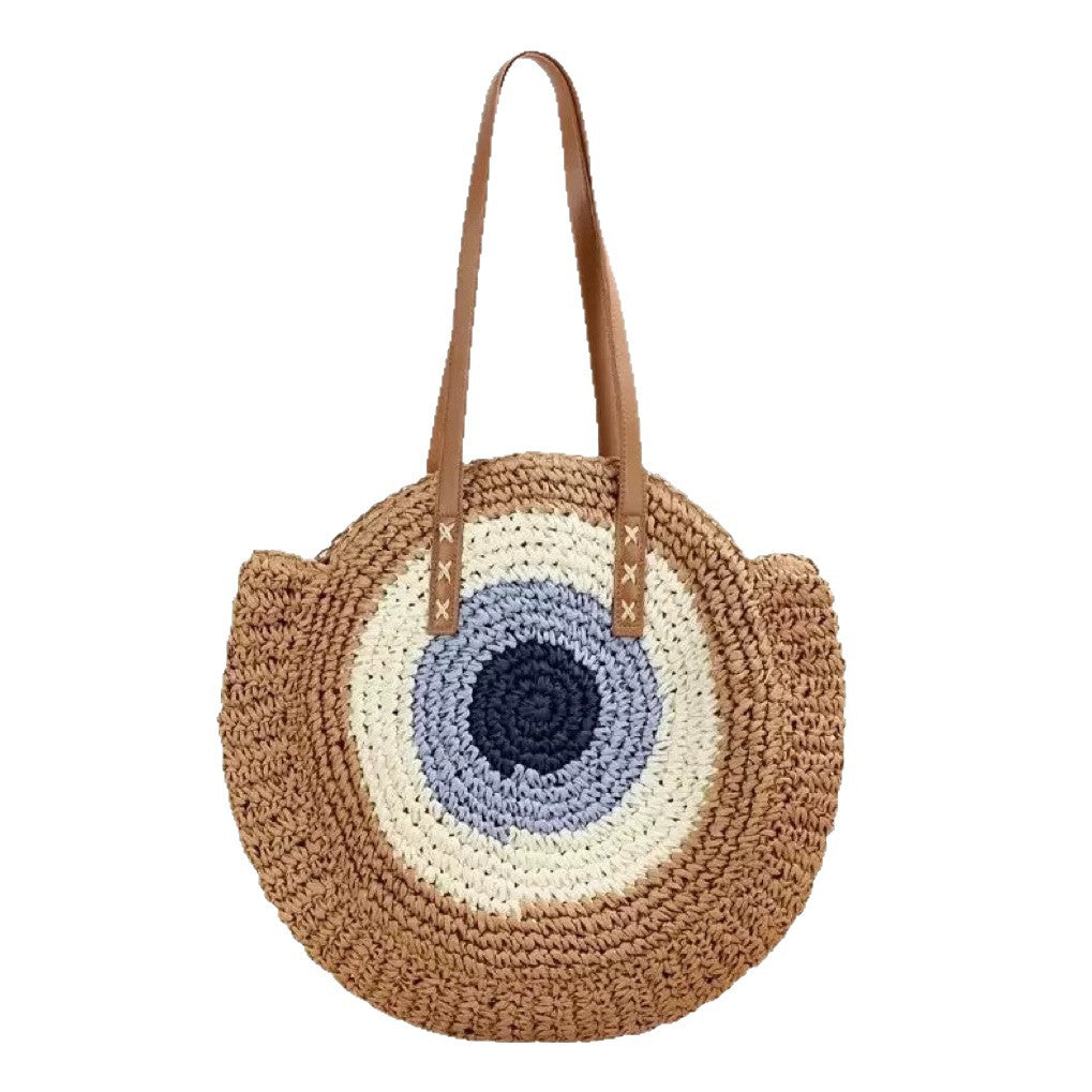 Braided basket bag with unique round design and elegant shoulder straps Kalsten