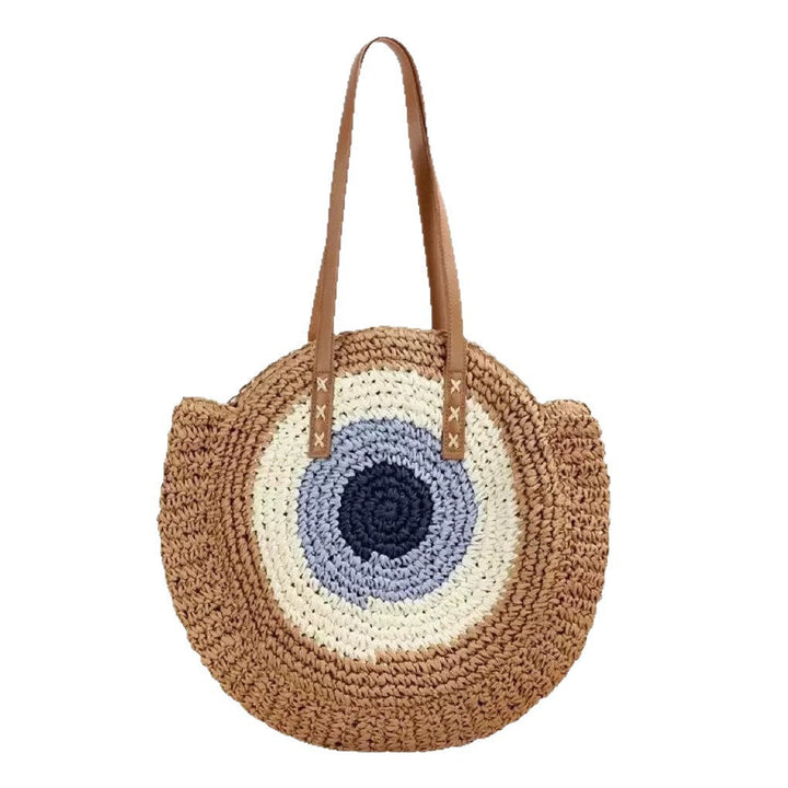 Braided basket bag with unique round design and elegant shoulder straps Kalsten