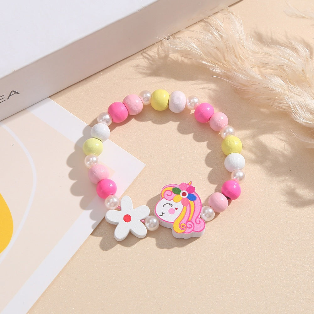 Playful children's bracelet with unicorn and flower motif Kalsten