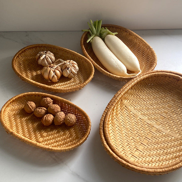 Women oval serving basket made of handwoven natural material Kalsten