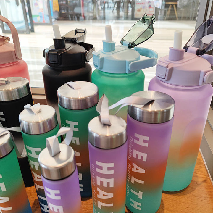 Women's insulated sports water bottle with ergonomic grip and leak-proof lid Kalsten