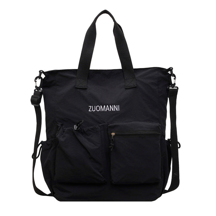 Tote bag with multifunctional outer pockets and adjustable shoulder strap Kalsten