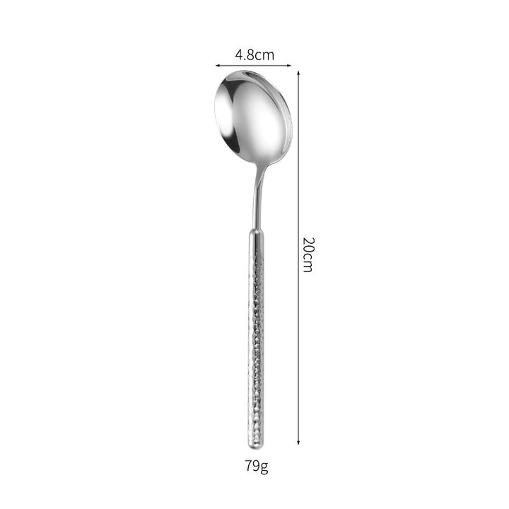 Elegant dessert spoon with elaborate handle design Kalsten