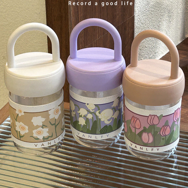 Women's insulated drinking bottle with ergonomic carrying handle and elegant flower design Kalsten