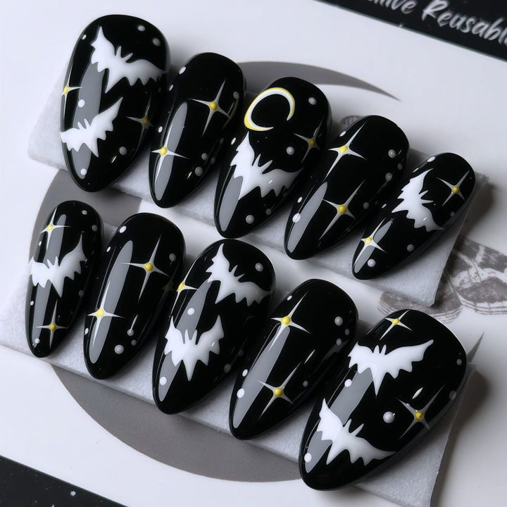 Artificial nails in creative Halloween bat design Kalsten