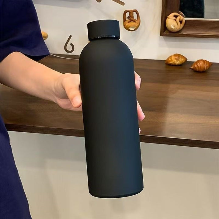Unisex double-walled stainless steel water bottle with matte powder coating, non-slip surface and leak-proof screw cap Kalsten