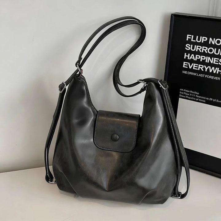 Modern shoulder bag with practical flap closure Kalsten