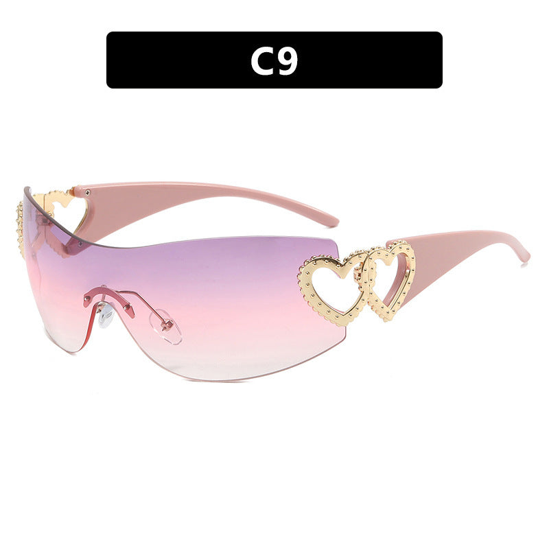 Ladies sporty sunglasses in trendy shield design with heart accents Kalsten