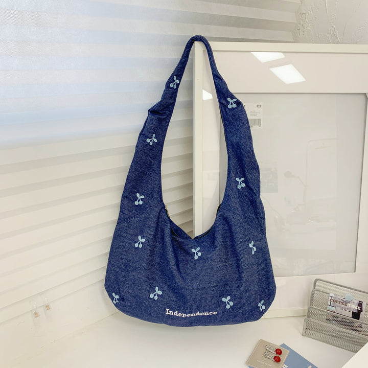 Comfortable shoulder bag with original embroidery motif Kalsten