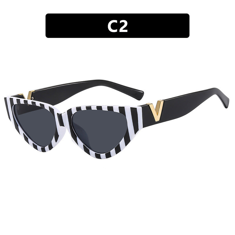 Women's Cat-Eye Sunglasses with Stylish Zebra Design and Luxurious Accents Kalsten