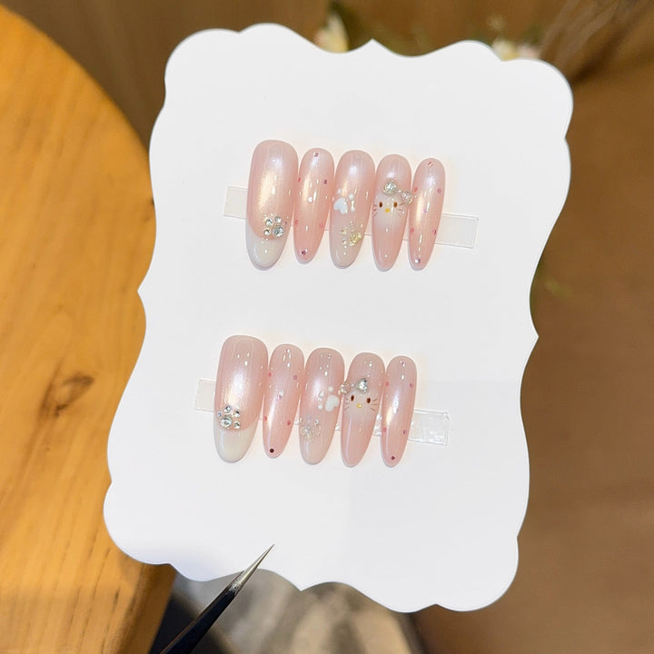 Artificial nail tips with playful penguin and paw print design Kalsten