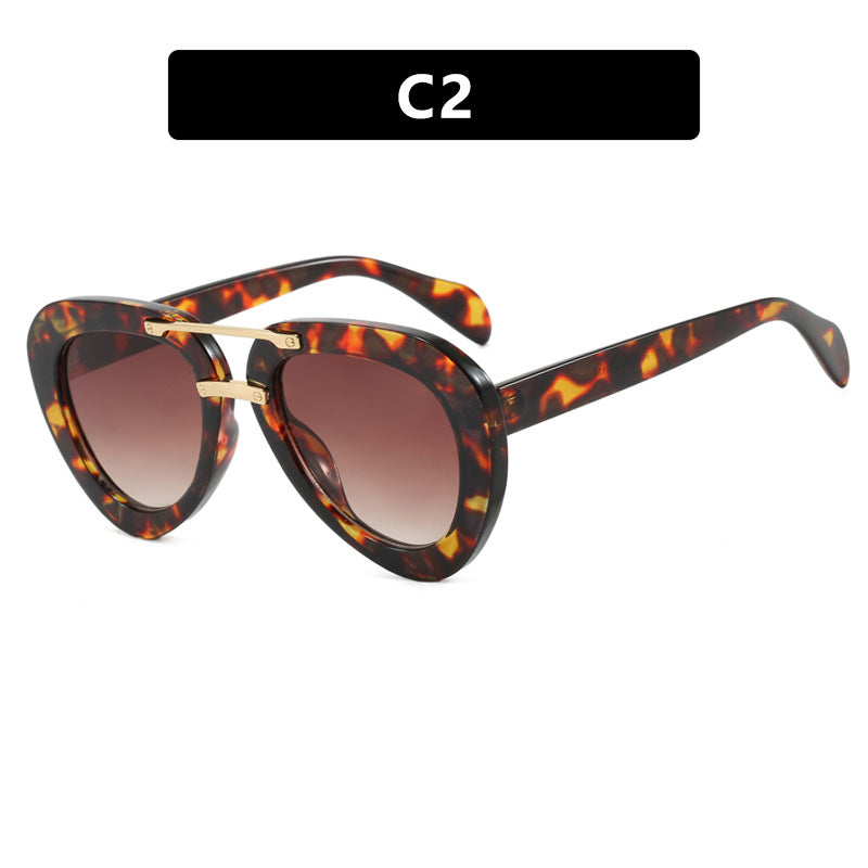 Womens extravagant sunglasses in modern heart design Kalsten