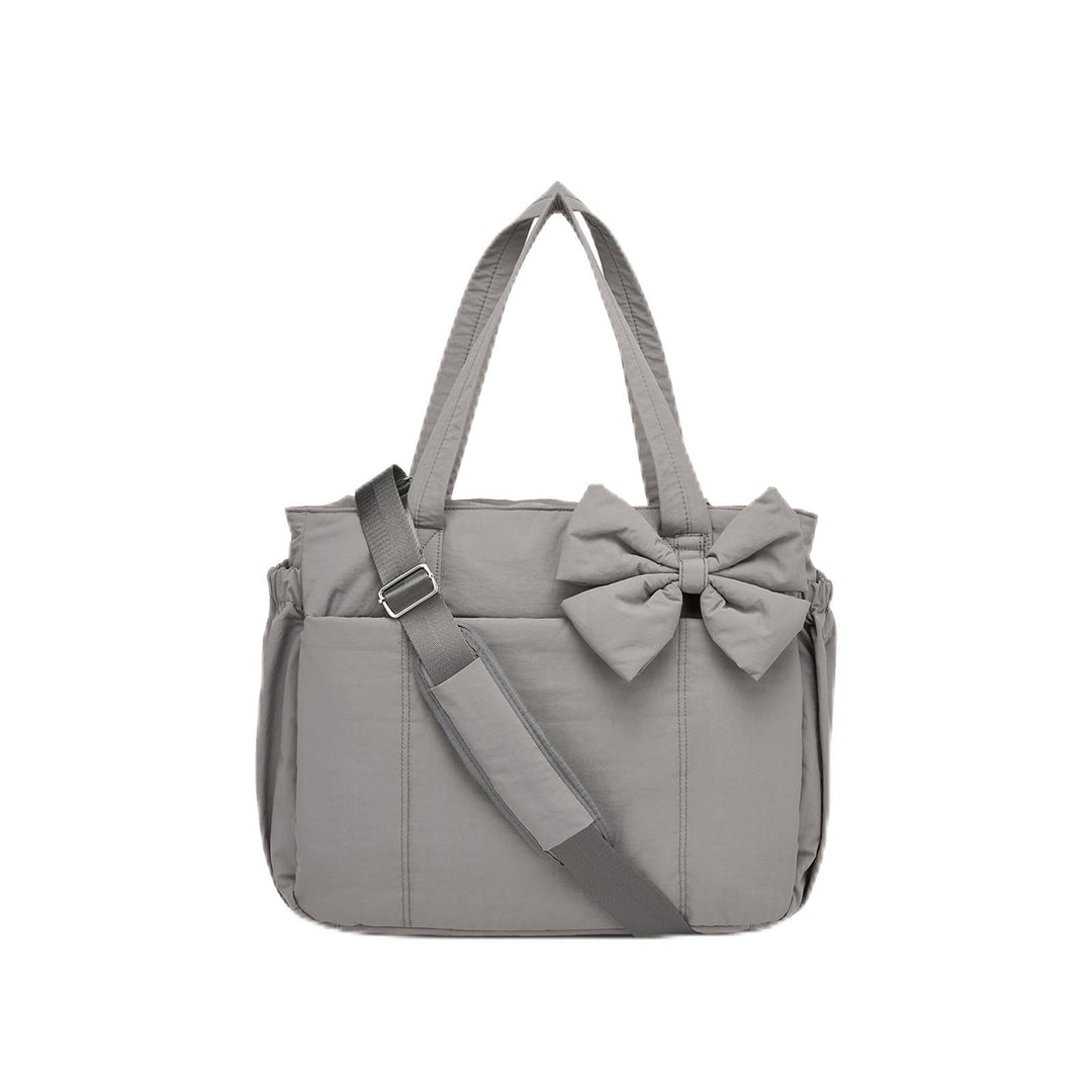 Multifunctional tote bag with detachable shoulder straps and decorative bow Kalsten