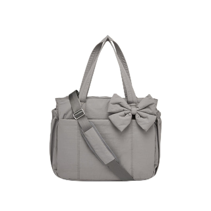 Multifunctional tote bag with detachable shoulder straps and decorative bow Kalsten