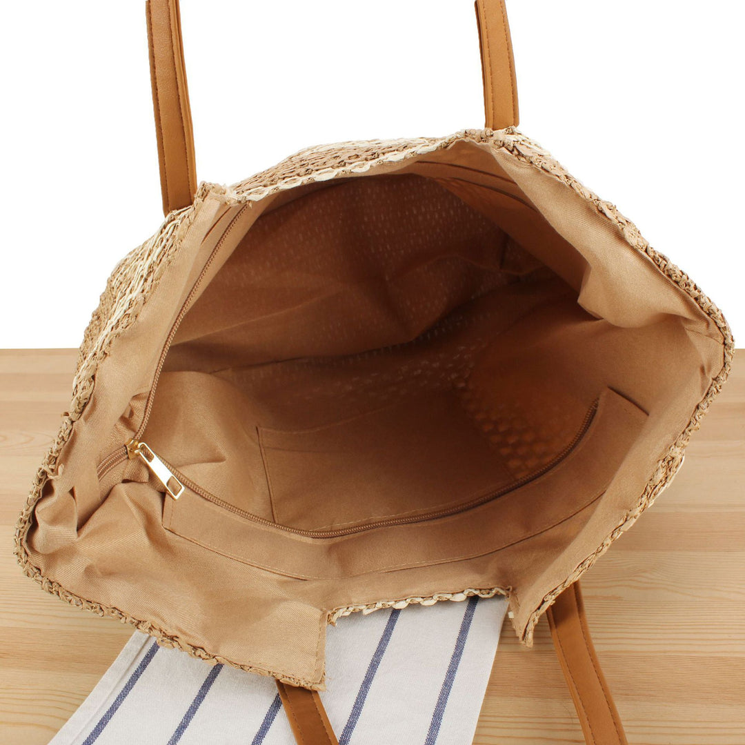 Shopping bag made of woven natural material with elegant leather handles Kalsten