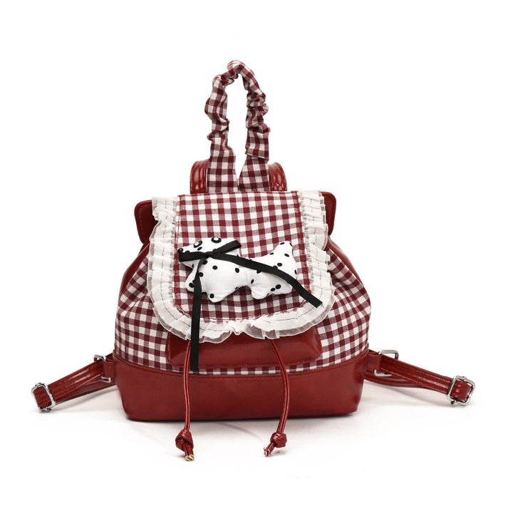 Playful backpack with checkered pattern and animal appliqué Kalsten