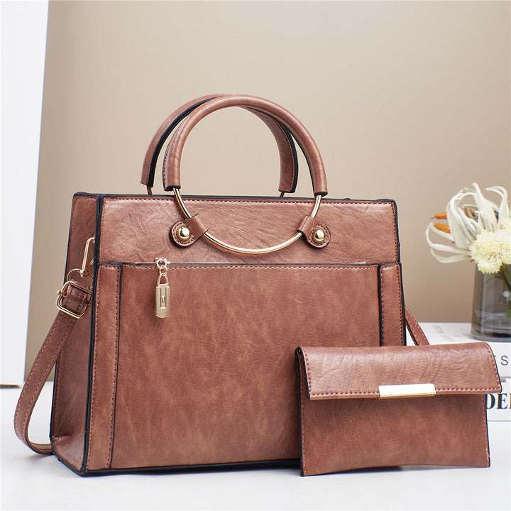 Elegant handbag with detachable shoulder strap and matching wallet Kalsten
