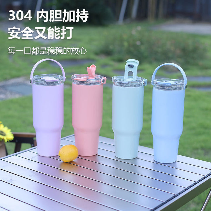 Women's insulated drinking cup with robust silicone grip and leak-proof lid Kalsten