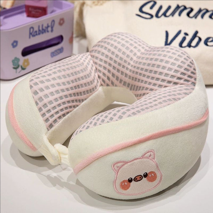 ergonomic plush neck pillow with animal motif Kalsten