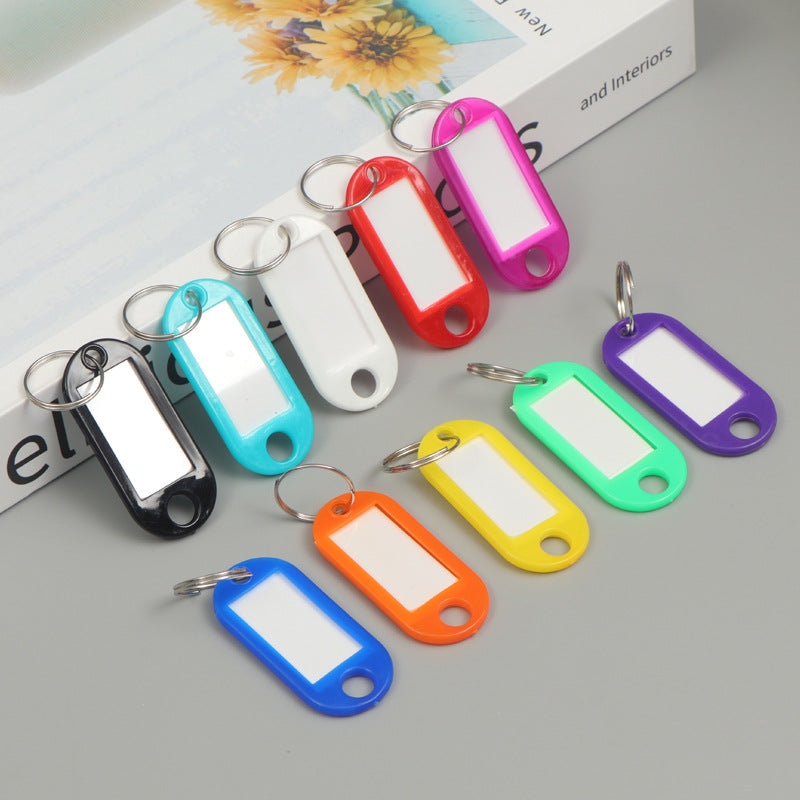 Unisex writable keychain with clear labeling field Kalsten