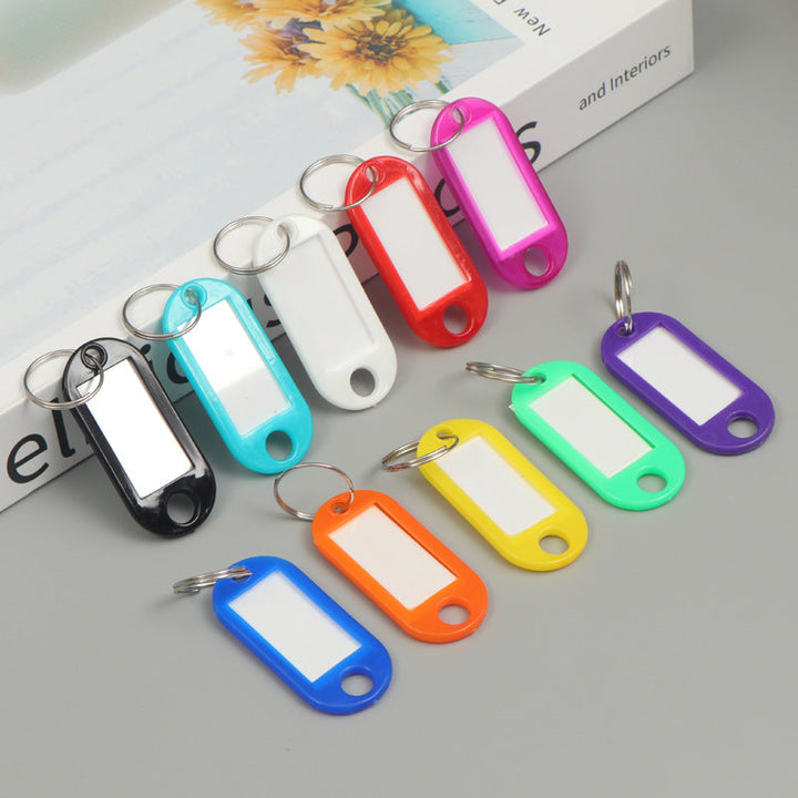 Unisex writable keychain with clear labeling field Kalsten