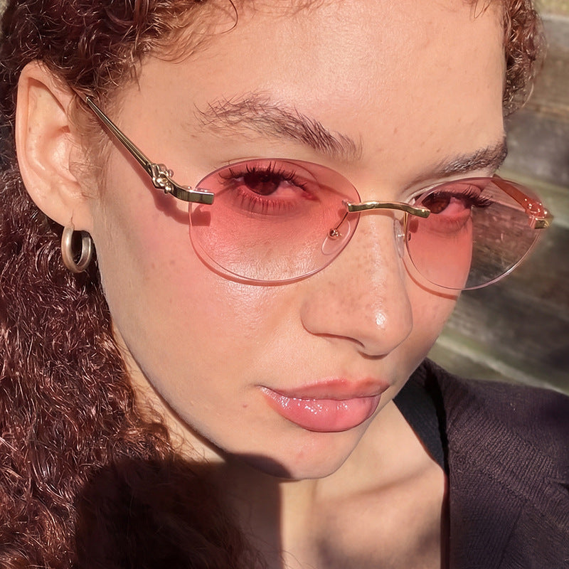 Women's elegant oval sunglasses with golden accents Kalsten