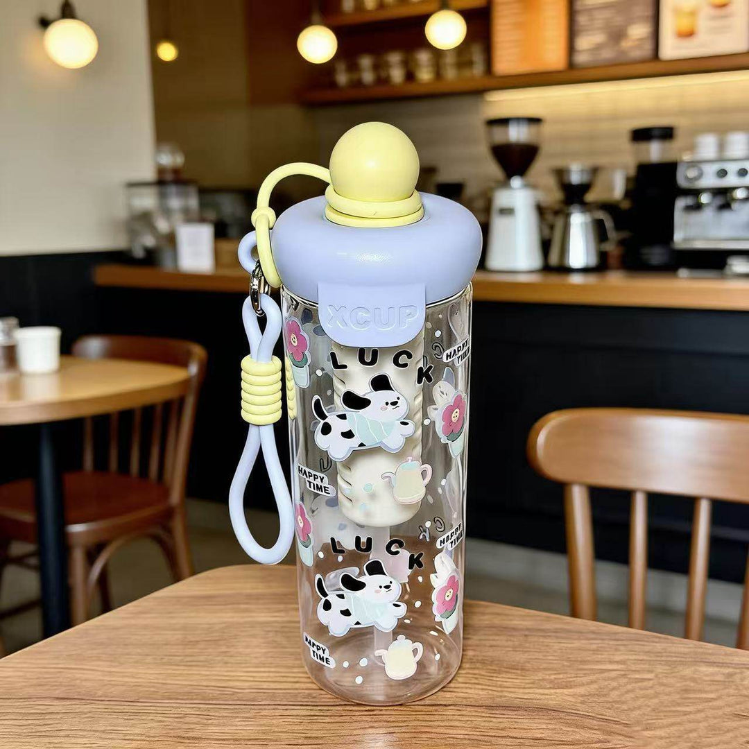 Women's water bottle with cheerful design and practical carrying handle Kalsten
