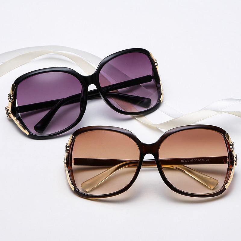Ladies elegant oversized sunglasses with golden accents Kalsten
